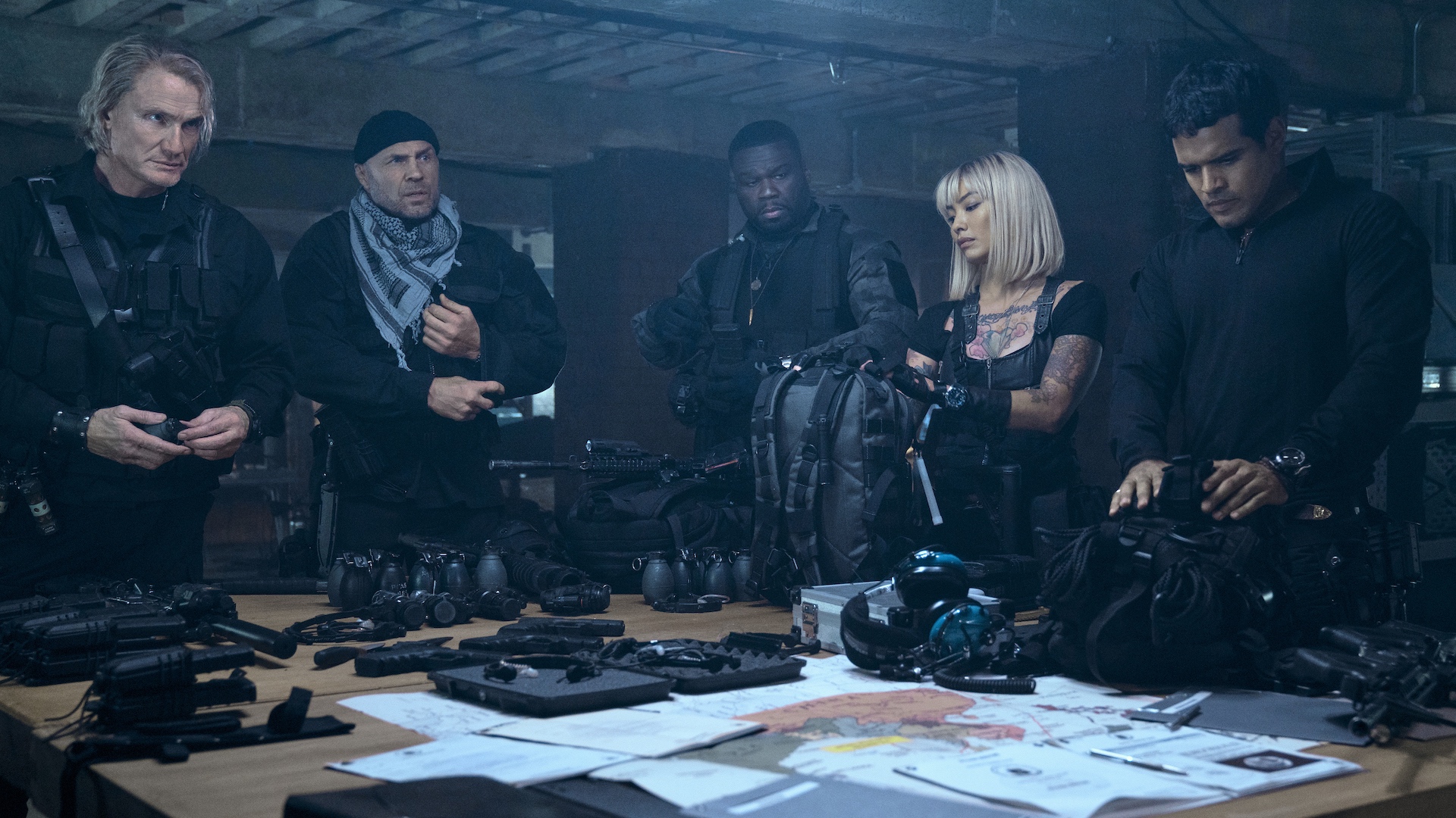 Dolph Lundgren as Gunner, Jason Statham as Lee, Curtis Jackson as Easy, Levy Tran as Lash and Jacob Scipio as Galan in Expendables 4 on Showmax