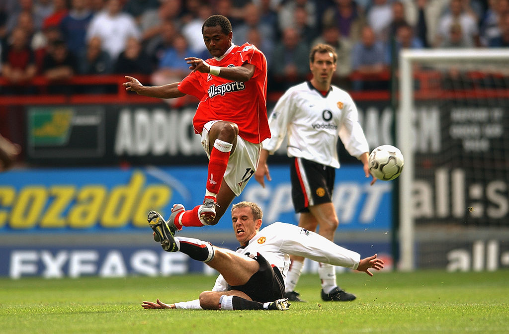 Shaun Bartlett of Charlton Athletic and Phil Neville of Manchester United