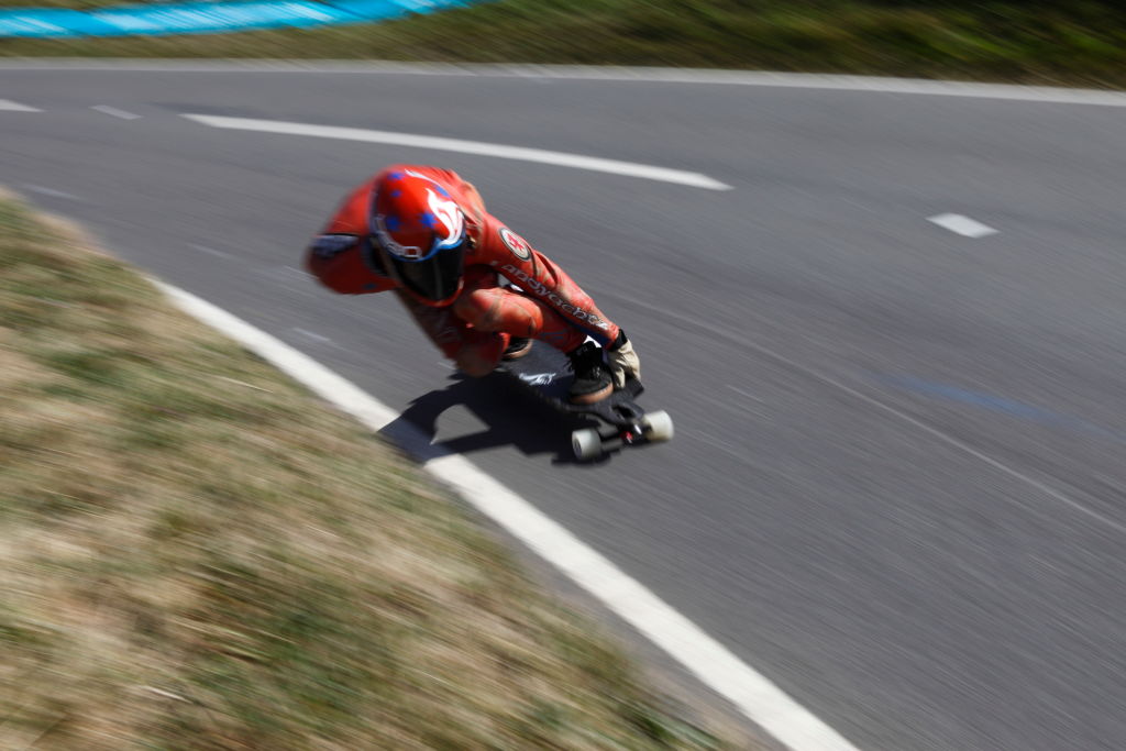 Speed skateboard rider competes during 'Speed Days' the UK's only World Cup downhill championships for street luge, skateboarders, classic luge and gravity bikes, held at Beachy Head, Eastbourne, UK. 22/08/2009