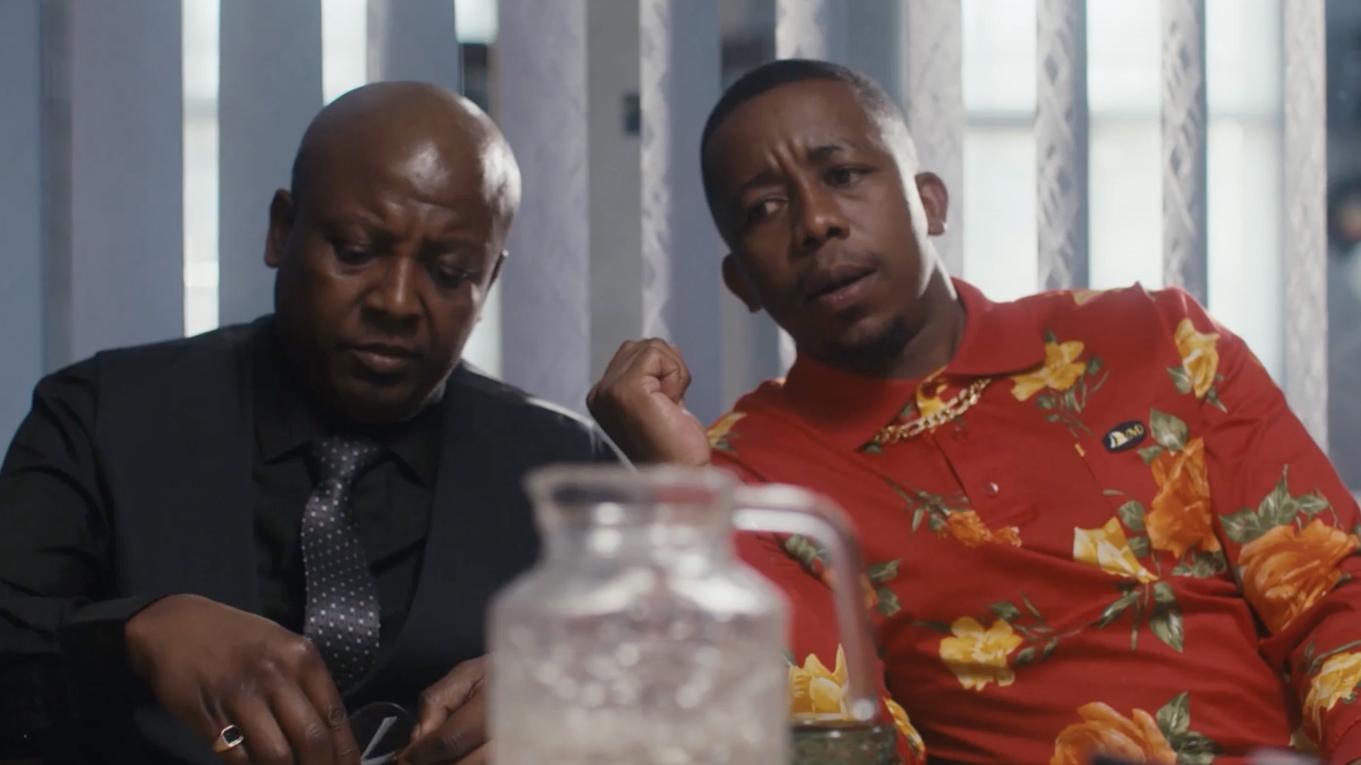 Nephtali Leotle as Pius and Mpho Sebeng as DJ Whiskey in 016FM
