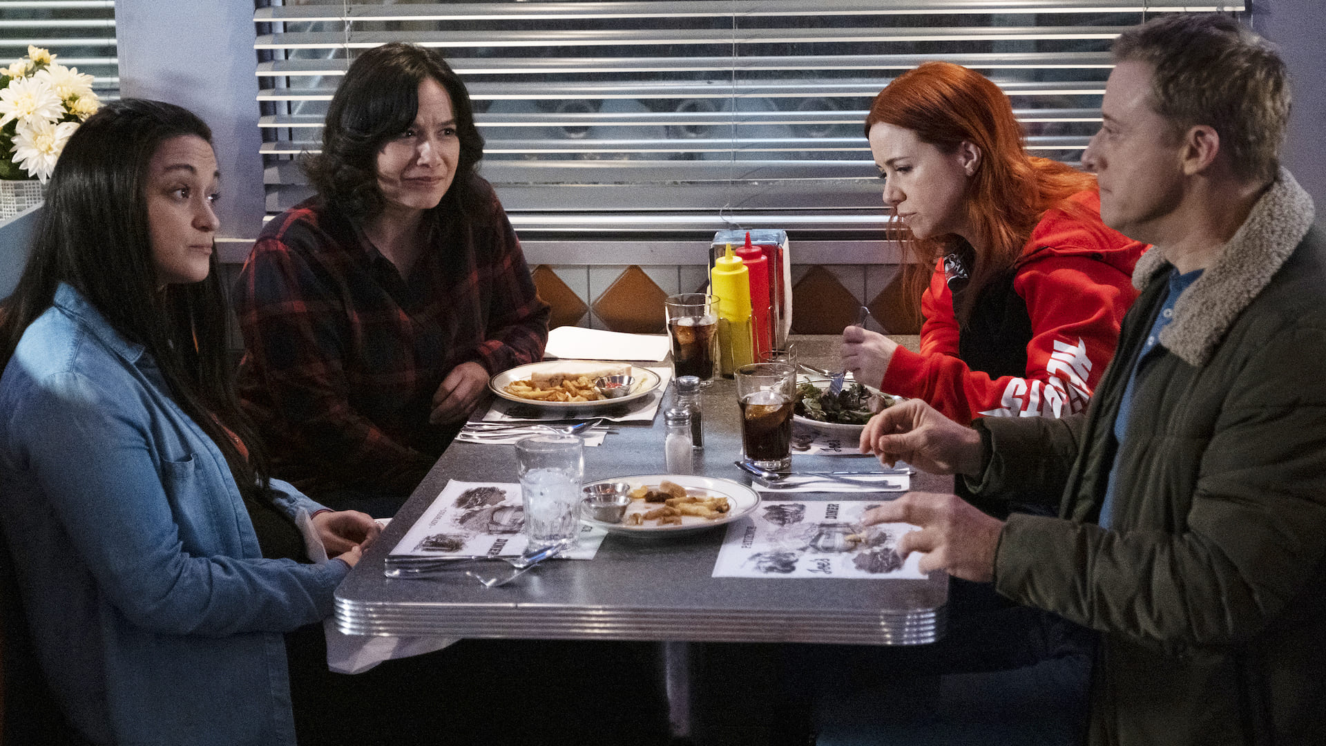 Sara Tomko as Asta Twelvetrees, Sarah Podemski as Kayla, Alice Wetterlund as D'Arcy Bloom and Alan Tudyk as Harry Vanderspeigle in Resident Alien S3