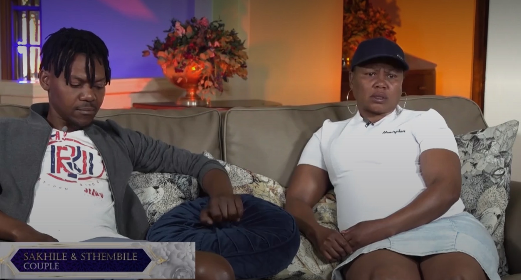 A couple on the couch in Mina Nawe House on Showmax